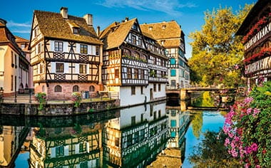 Houses by a canal in Strasbourg, France Houses by a canal in Strasbourg, France